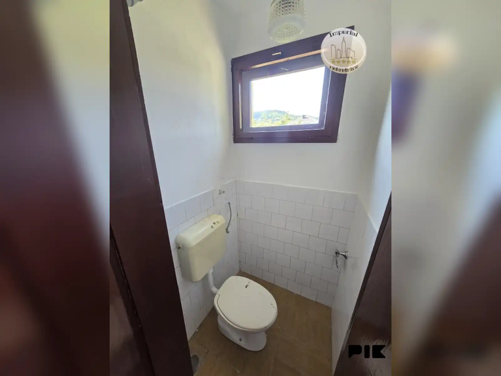 kuca-pale-sa-2-odvojena-stana-od-po-100m2-garaza1556m2-okucnice