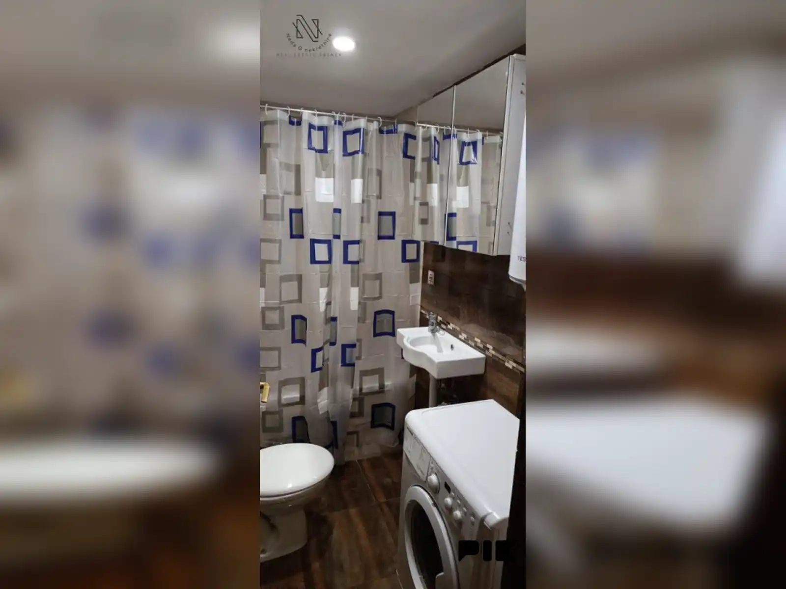 kuca-sa-5-apartmana-i-poslovnim-prostorom-u-budzaku