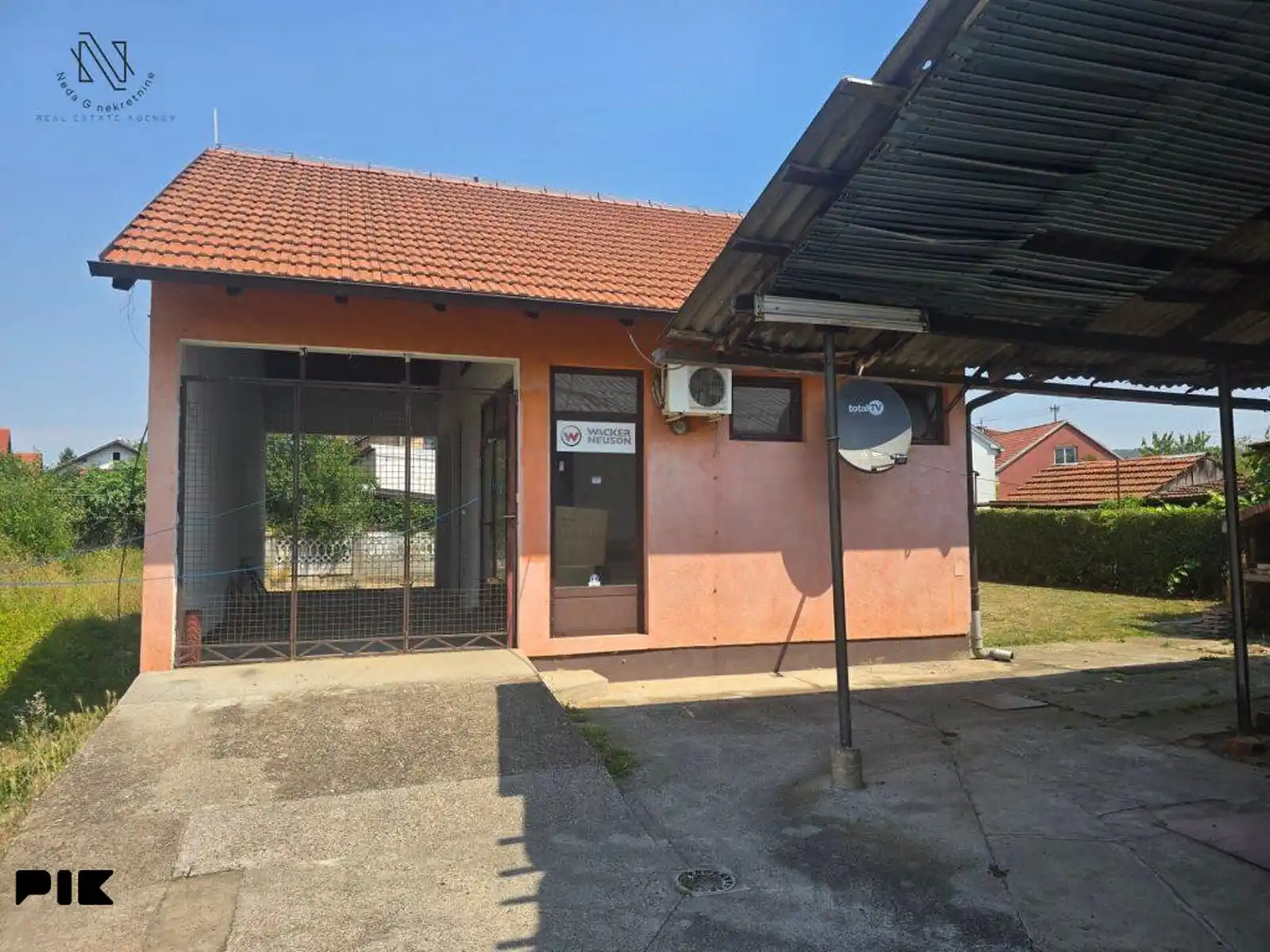 kuca-sa-5-apartmana-i-poslovnim-prostorom-u-budzaku