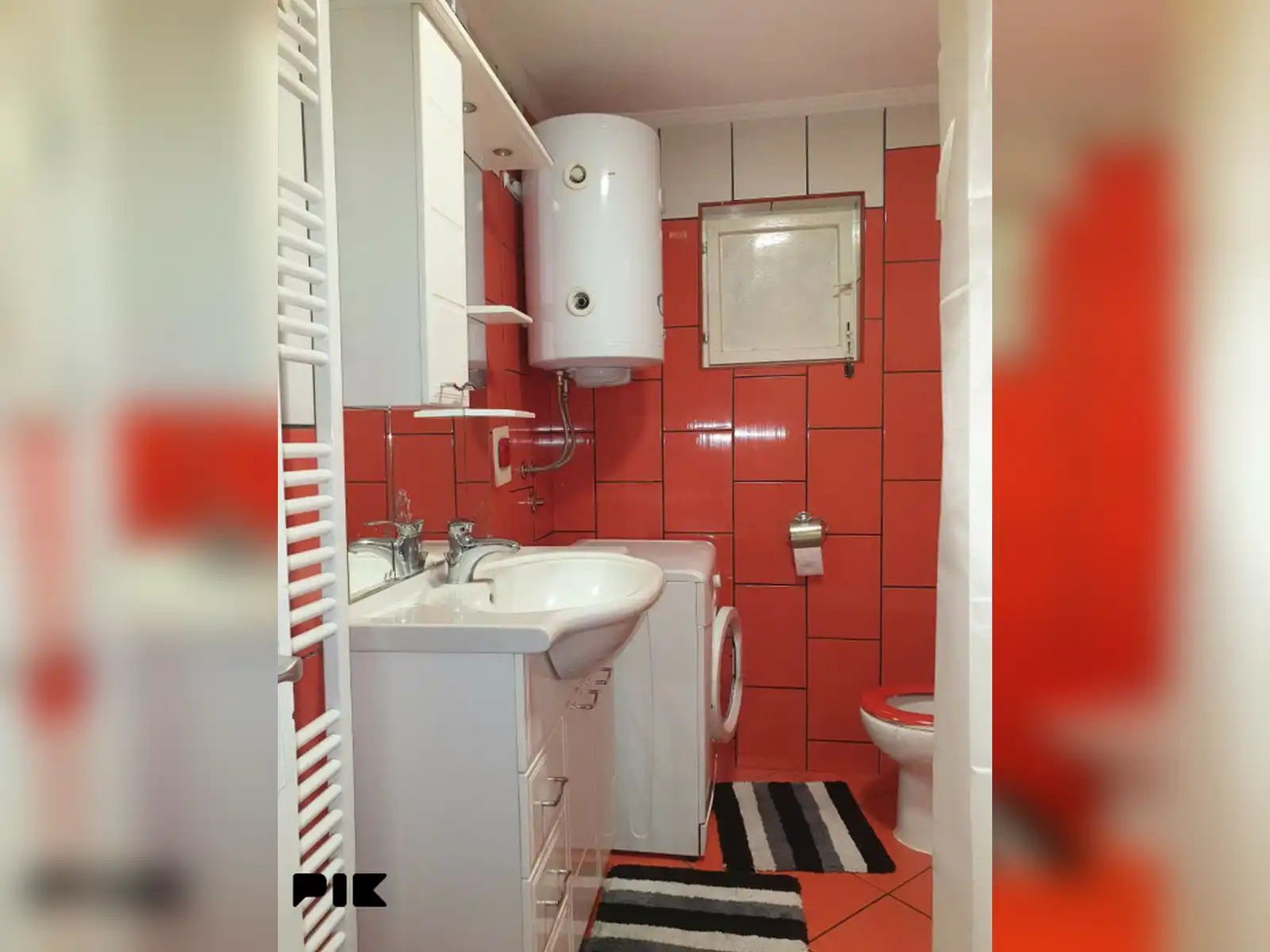 kuca-sa-5-apartmana-i-poslovnim-prostorom-u-budzaku